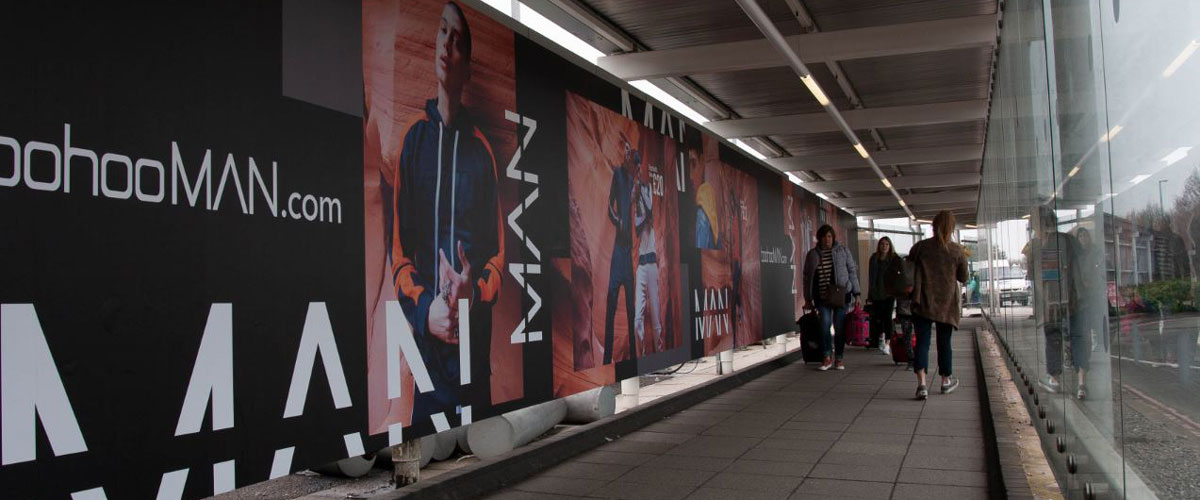 Boohoo Man, Boohoo, Bristol International Airport, Large Wall Wrap, External Walkway Airport Advertising